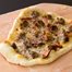 Thumbnail image for Thin Crust Pizza with Shepherd’s Way Farms’ Friesago, Shepherd’s Way Farms’ Merguez Lamb Sausage, & Fresh Chanterelles and Thyme